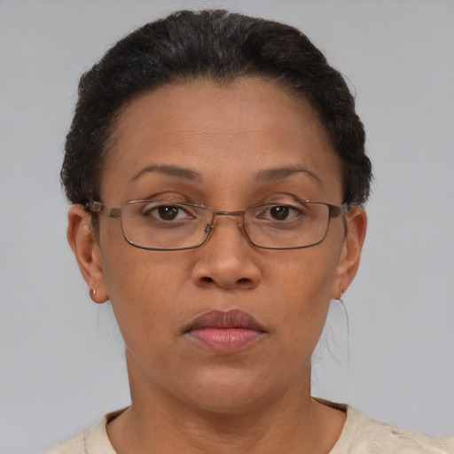 Neutral asian adult female with short  brown hair and brown eyes