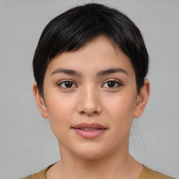 Joyful white young-adult female with short  black hair and brown eyes