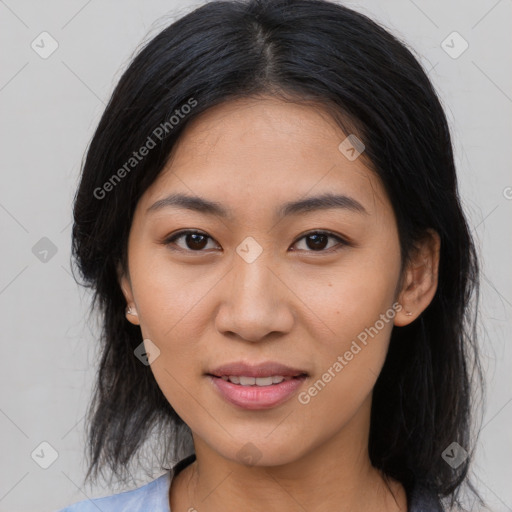 Joyful asian young-adult female with medium  brown hair and brown eyes