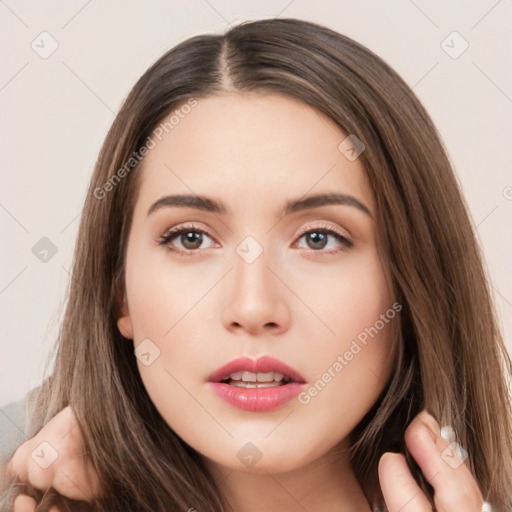 Neutral white young-adult female with long  brown hair and brown eyes