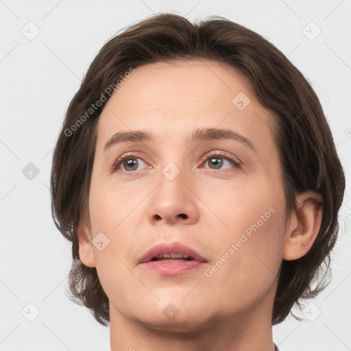 Neutral white young-adult female with medium  brown hair and brown eyes