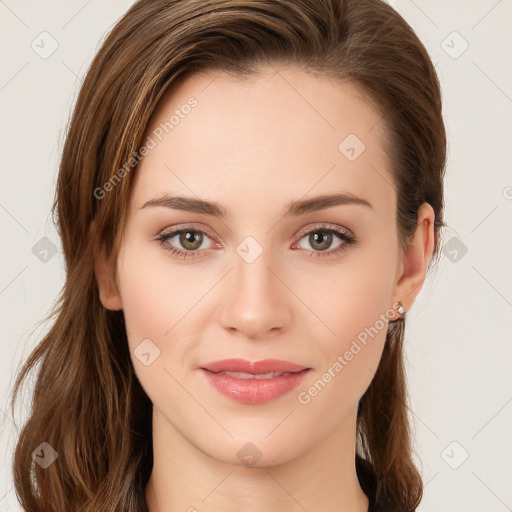 Joyful white young-adult female with long  brown hair and green eyes