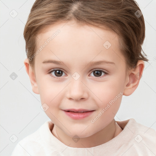 Joyful white child female with short  brown hair and brown eyes