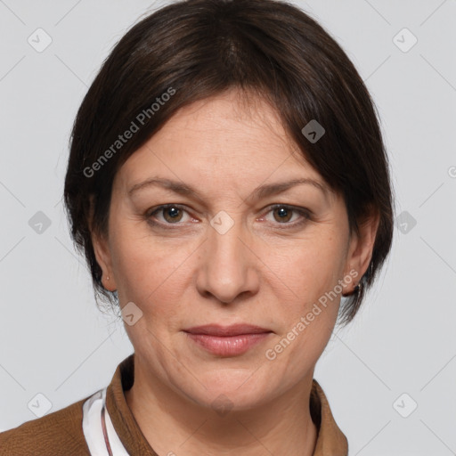 Joyful white adult female with medium  brown hair and grey eyes