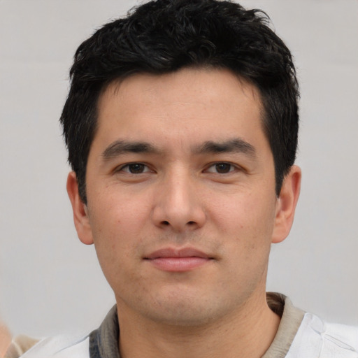 Neutral white young-adult male with short  black hair and brown eyes