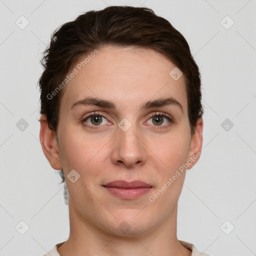 Joyful white young-adult female with short  brown hair and grey eyes