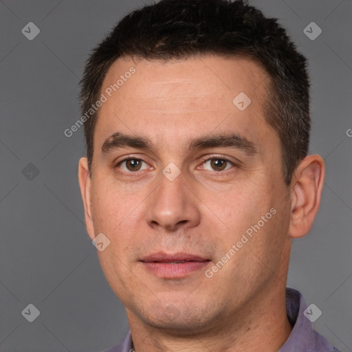 Joyful white adult male with short  brown hair and brown eyes