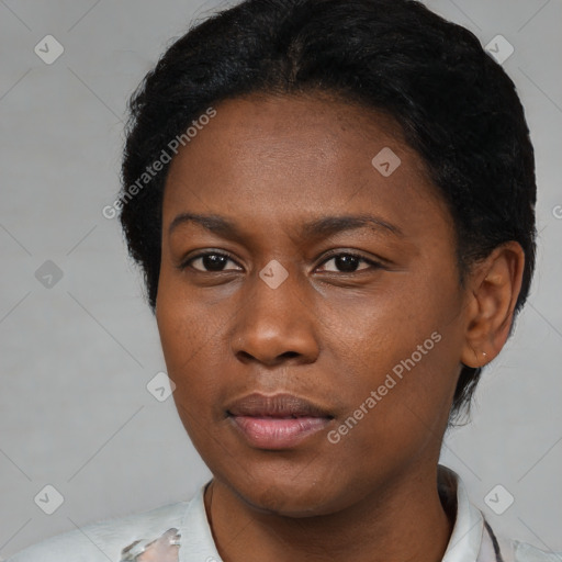 Neutral black young-adult female with medium  black hair and brown eyes