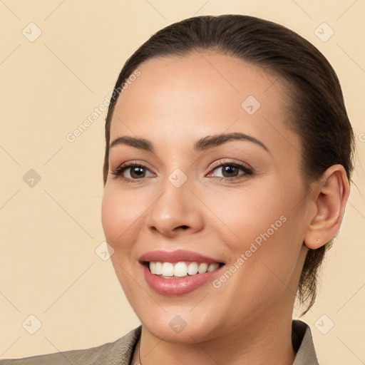 Joyful white young-adult female with long  brown hair and brown eyes