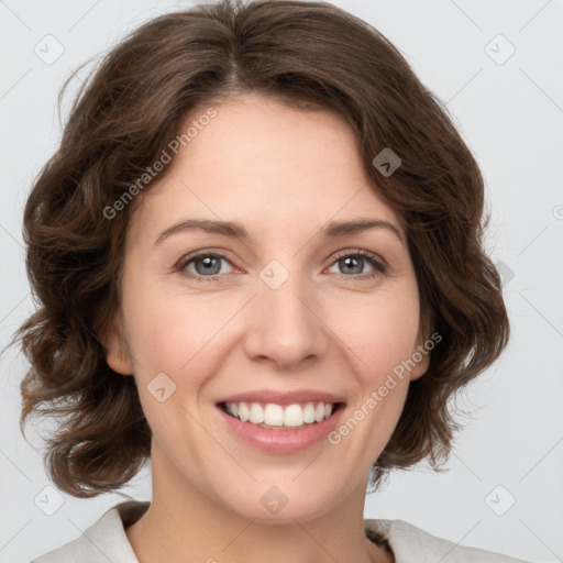 Joyful white young-adult female with medium  brown hair and green eyes