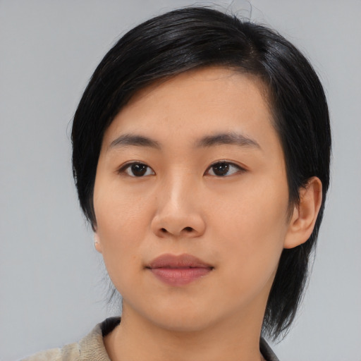 Neutral asian young-adult female with medium  black hair and brown eyes