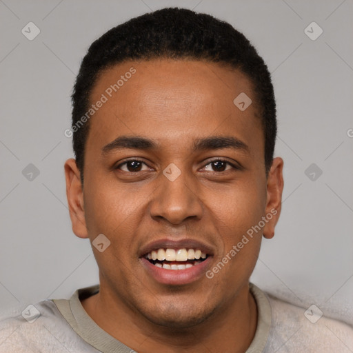 Joyful black young-adult male with short  black hair and brown eyes