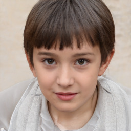 Joyful white child female with short  brown hair and brown eyes