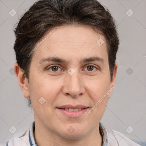 Joyful white adult male with short  brown hair and grey eyes