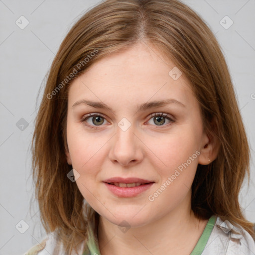 Joyful white young-adult female with medium  brown hair and blue eyes