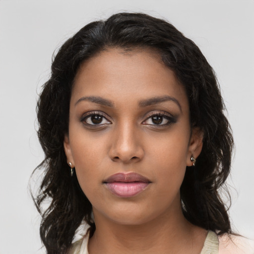Neutral latino young-adult female with medium  brown hair and brown eyes