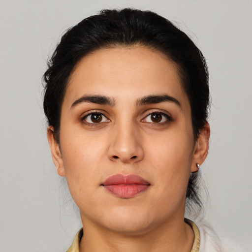 Neutral latino young-adult female with short  black hair and brown eyes