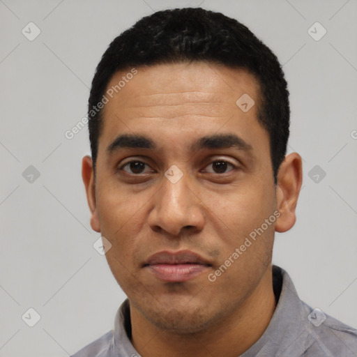 Neutral latino adult male with short  black hair and brown eyes