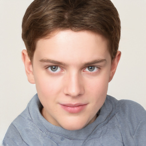 Joyful white child female with short  brown hair and grey eyes