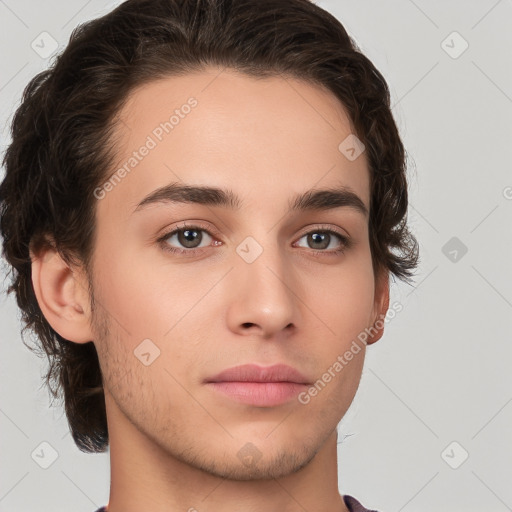 Neutral white young-adult male with medium  brown hair and brown eyes