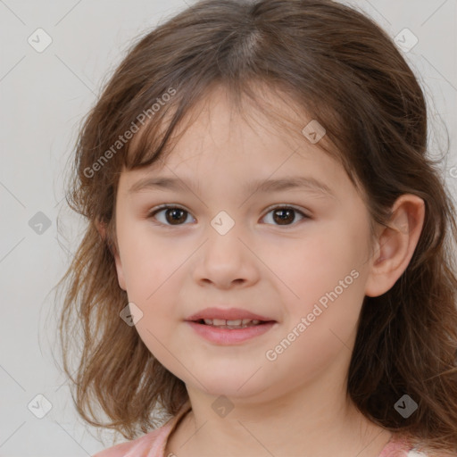 Joyful white child female with medium  brown hair and brown eyes