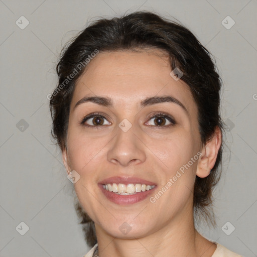 Joyful white young-adult female with medium  brown hair and brown eyes