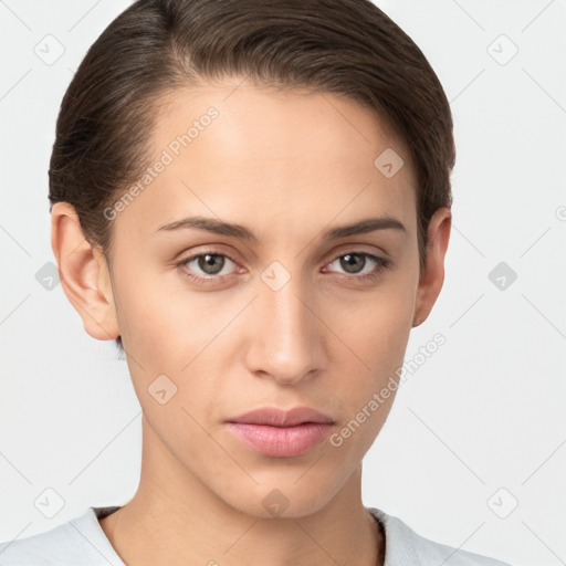 Neutral white young-adult female with short  brown hair and brown eyes