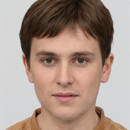 Neutral white young-adult male with short  brown hair and grey eyes