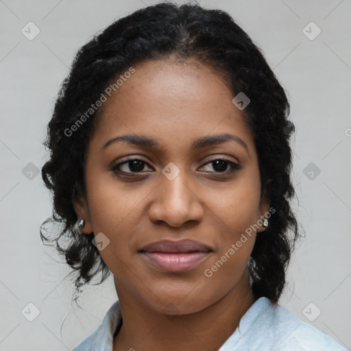 Joyful black young-adult female with long  black hair and brown eyes