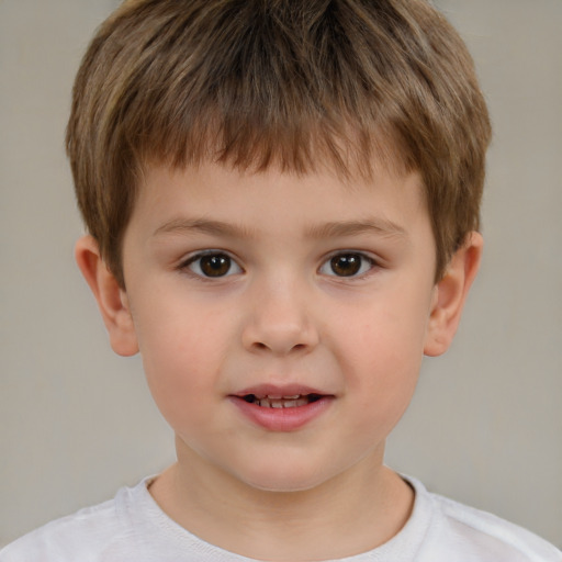 Joyful white child male with short  brown hair and brown eyes