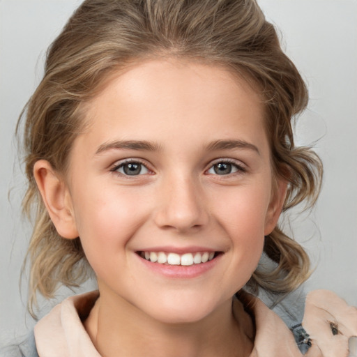 Joyful white child female with medium  brown hair and brown eyes