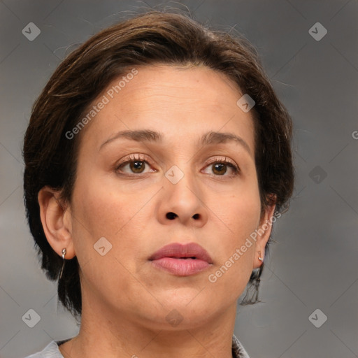 Joyful white adult female with medium  brown hair and brown eyes