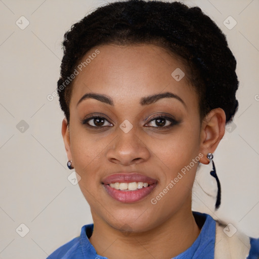 Joyful black young-adult female with short  brown hair and brown eyes
