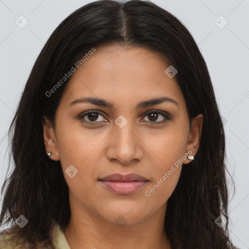 Joyful latino young-adult female with long  brown hair and brown eyes