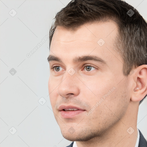 Neutral white young-adult male with short  brown hair and brown eyes