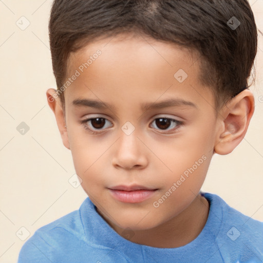 Joyful white child male with short  brown hair and brown eyes