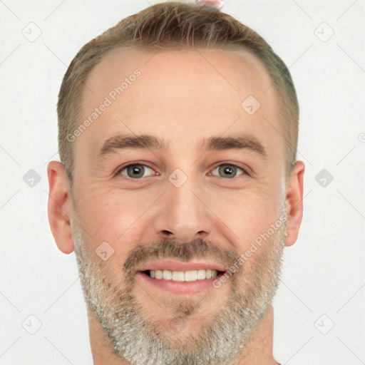 Joyful white adult male with short  brown hair and brown eyes