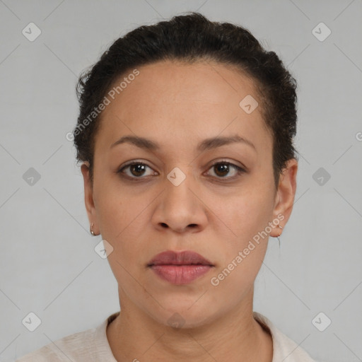 Joyful black young-adult female with short  brown hair and brown eyes