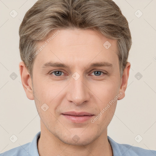 Joyful white adult male with short  brown hair and grey eyes