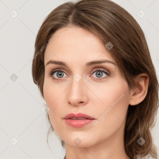 Neutral white young-adult female with medium  brown hair and green eyes