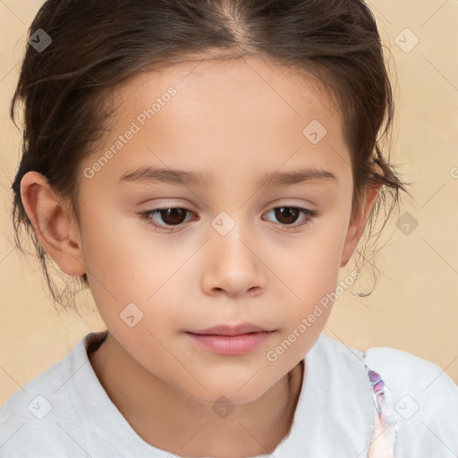 Joyful white child female with short  brown hair and brown eyes