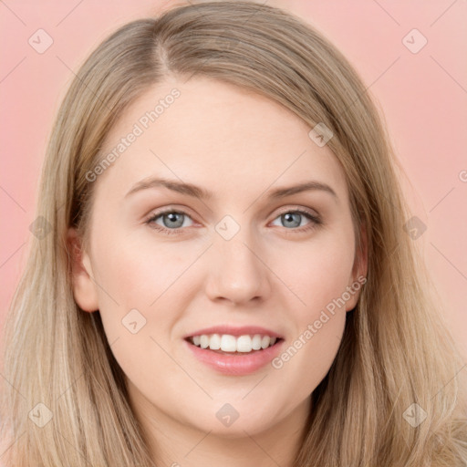 Joyful white young-adult female with long  brown hair and grey eyes