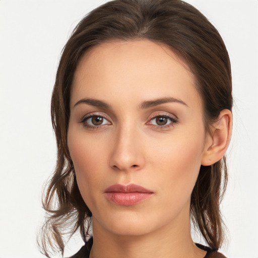 Neutral white young-adult female with medium  brown hair and brown eyes