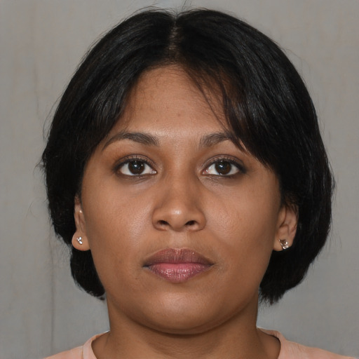 Neutral asian young-adult female with medium  brown hair and brown eyes