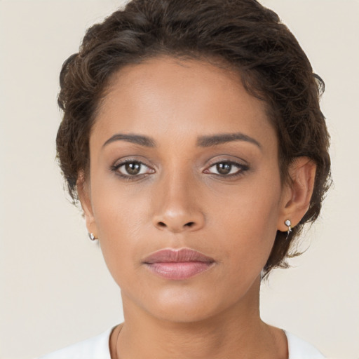 Neutral white young-adult female with short  brown hair and brown eyes