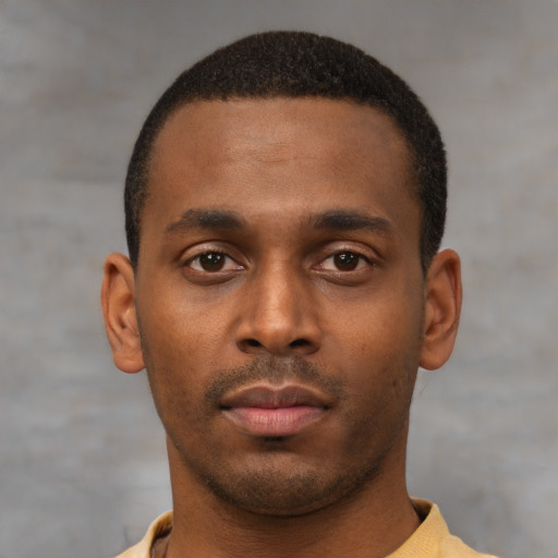 Neutral latino young-adult male with short  brown hair and brown eyes