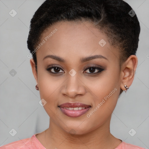 Joyful black young-adult female with short  brown hair and brown eyes