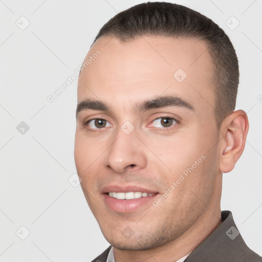 Joyful white young-adult male with short  brown hair and brown eyes