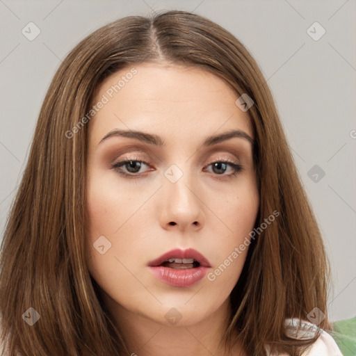 Neutral white young-adult female with long  brown hair and brown eyes