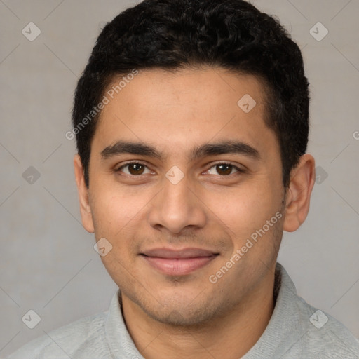 Joyful latino young-adult male with short  brown hair and brown eyes